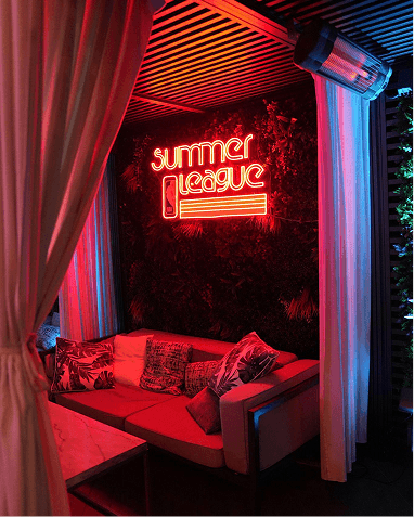 Summer League neon lounge cabana activation.png