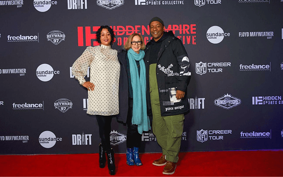 Roxanne Taylor, Michelle Satter and Deon Taylor on the red carpet.png